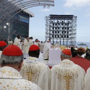 Cardinals stand nearby as Pope Francis celebrates the closing Mass of World Yout