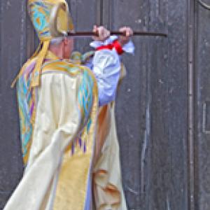 New Bishop of Durham knocking on door at Saturday's ceremony. Image from durham.