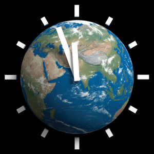 There is an image of a globe with a clock superimposed on top, with the minute hand almost striking midnight. 