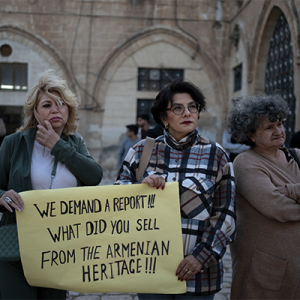 Members of the Armenian community protest a contentious deal that stands to displace residents and hand over a large section of the Armenian Quarter in the Old City of Jerusalem, Friday, May 19, 2023.