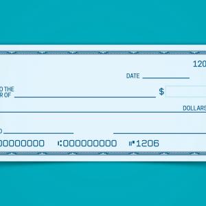 A realistic illustration of a pale blue blank check set on top of a teal background.