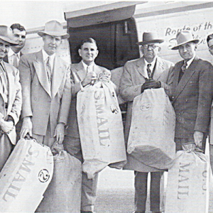 Roy M. Bird, the author’s grandfather (far right) attends the opening of airmail service to Magnolia, Ark., 1952.