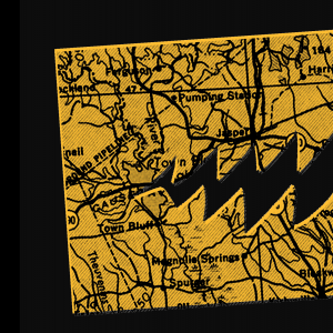 A map is cut out to look like a pac man with chomping, sharp teeth.