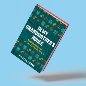 The cover of In My Grandmother's House is blue with small yellow and orange designs.