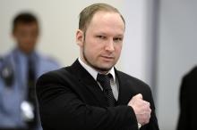 Anders Behring Breivik places a clenched fist on his heart as he arrives in central court in Oslo. ODD ANDERSEN/AFP/Getty Images ODD ANDERSEN/AFP/Getty Images