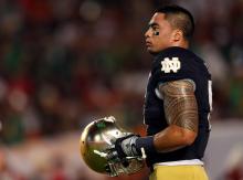 Manti Te'o #5 of the Notre Dame Fighting Irish warms up before a game. Mike Ehrmann/Getty Images Mike Ehrmann/Getty Images