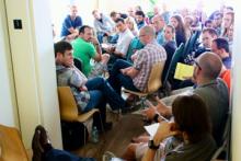 Rob Bell listens to a question from the audience at a conference Tuesday. Photo by Cathleen Falsani/Sojourners.