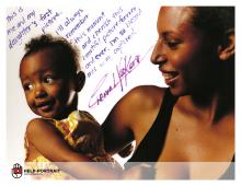 A Help-Portrait photo illustrates a first portrait of a mother and daughter. Photo courtesy of Jeremy Cowart via RNS Jeremy Cowart via RNS