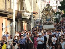 A church procession detoured to pass the house of a convicted mobster. Creative Commons image by Il Fatto Quotidiano