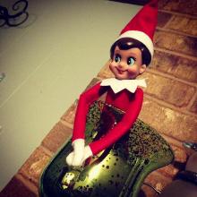 This elf keeps an eye out from a wine glass. Ladybugbkt/Flickr/Creative Commons Ladybugbkt/Flickr/Creative Commons