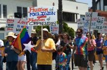 Marchers at a lesbian and gay pride parade in Long Beach, California. Photo courtesy Juan Camilo Bernal/shutterstock.com