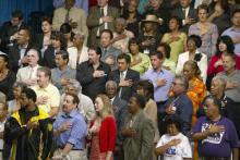A crowd recites the Pledge of Allegiance at a Kerry campaign rally in 2004. Photo via American Spirit via Shutterstock/RNS.