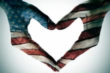 Flag-painted hands in the shape of a heart, nito / Shutterstock.com Flag-painted hands in the shape of a heart, nito / Shutterstock.com