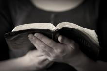 A close-up of a christian woman reading the Bible. Kjetil Kolbjornsrud / Shutterstock Kjetil Kolbjornsrud / Shutterstock