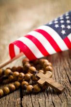 Cross and flag. Image via Jiri Hera/shutterstock.com Cross and flag. Image via Jiri Hera/shutterstock.com