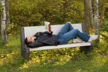 Man reading in the park, dragon_fang / Shutterstock.com Man reading in the park, dragon_fang / Shutterstock.com