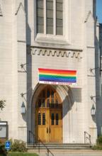 A church with a sign welcoming gay and lesbian members. Photo courtesy of Ivan Cholakov via Shutterstock/RNS.