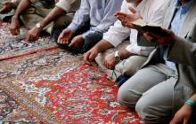 Muslim men singing a lament. 4634093993 / Shutterstock 4634093993 / Shutterstock