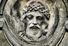 Face of Jesus from an old cemetery statue. Photo by Brasiliao/Shutterstock.com. Face of Jesus from an old cemetery statue. Photo by Brasiliao/Shutterstock.com.