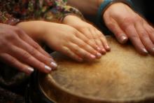 Hands of music teacher and student, Anna Jurkovska / Shutterstock.com Hands of music teacher and student, Anna Jurkovska / Shutterstock.com