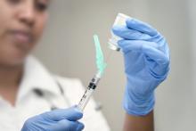 Syringe preparation by a female doctor. Marlon Lopez / Shutterstock.com Marlon Lopez / Shutterstock.com