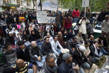Imam leads muslims in a sermon at Occupy Wall Street by Lev Radin/Shutterstock.