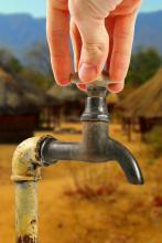 Americans spend $450 billion on Christmas; $20 billion would give water to the world for a year. ronstik/Shutterstock ronstik/Shutterstock
