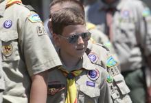A Boy Scout marches with his troop during the Memorial Day parade in Smithtown, N.Y., May 27. Photo via Gregory A. Shemitz / RNS Photo via Gregory A. Shemitz / RNS