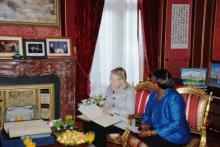 Hillary Rodham Clinton meets with Ambassador for International Religious Freedom Suzan Johnson. Photo via RNS