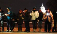 Immigration reform supporters pray and sing in English and Spanish outside the U.S. Capitol. Photo via Katherine Burgess / RNS Photo via Katherine Burgess / RNS