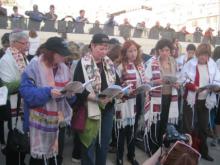 Many members and supporters of Women of the Wall pray with prayer shawls. RNS photo by Michele Chabin RNS photo by Michele Chabin