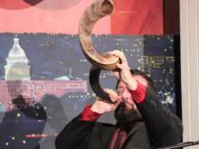 Rabbi Neal Surasky of Chosen People Ministries in New York blows the shofar. Photo via Adelle M. Banks/RNS.