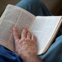 Reading the Bible. Image via RNS. Reading the Bible. Image via RNS.