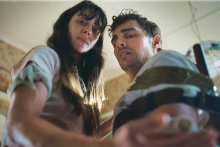 Scene from horror film Together featuring Alison Brie and Dave Franco.