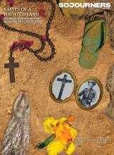 A rosary, an open-faced locket, a flip-flop, a used water bottle, and a dying flower lying abandoned in the dirt.