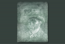 An x-ray image of a faded van Gogh self-portrait, which depicts him in a slight side profile to the camera. Van Gogh has a short beard and is wearing a hat and jacket.