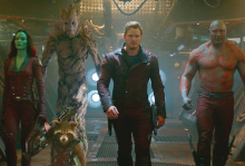 the image shows four characters, a woman with green skin, a tree, a white guy, and a bald guy with red streaks.