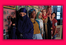 A scene from 'We Are Lady Parts' with a group of women in hijabs.