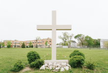 A cross on the lawn of Precious Blood ministry in Chicago.