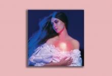The cover for the music album ‘And in the Darkness, Hearts Aglow’ by Weyes Blood. The artist, Natalie Mering, has long hair and looks to the side. She wears a low-cut dress with her upper chest exposed. A warm light glows from within where her heart is.