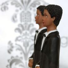 Two grooms wedding cake topper. Image via Wylio, http://bit.ly/x8aDYB. Two grooms wedding cake topper. Image via Wylio, http://bit.ly/x8aDYB.