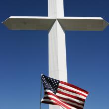 Cross and Flag. Image via Wylio http://bit.ly/rU6OGA Cross and Flag. Image via Wylio http://bit.ly/rU6OGA