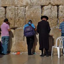 Pilgrims and tourists pray at the Wailing Wall in Jerusalem. Via Wylio http://bit.ly/wsudSt. Tourists pray at the Wailing Wall in Jerusalem. Via Wylio http://bit.ly/wsudSt.