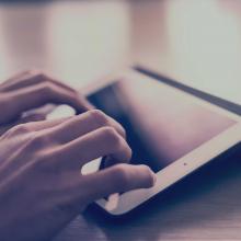 typing on a tablet typing on a tablet
