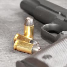 Gun image, val lawless / Shutterstock.com