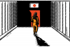 A woman wearing an orange jumpsuit walks down a hallway toward a door with a first-aid symbol over it.