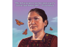 The image shows Elvira Arellano, a hispanic advocate for undocumented immigrants. There are monarch butterflies circling her head. 